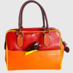 grand sac à main en cuir, fabrication française artisanal. Pièce unique et original pour des femmes de caractère qui affirment leur différence. Maela créations, maroquinerie artisanale à Audierne en bretagne.